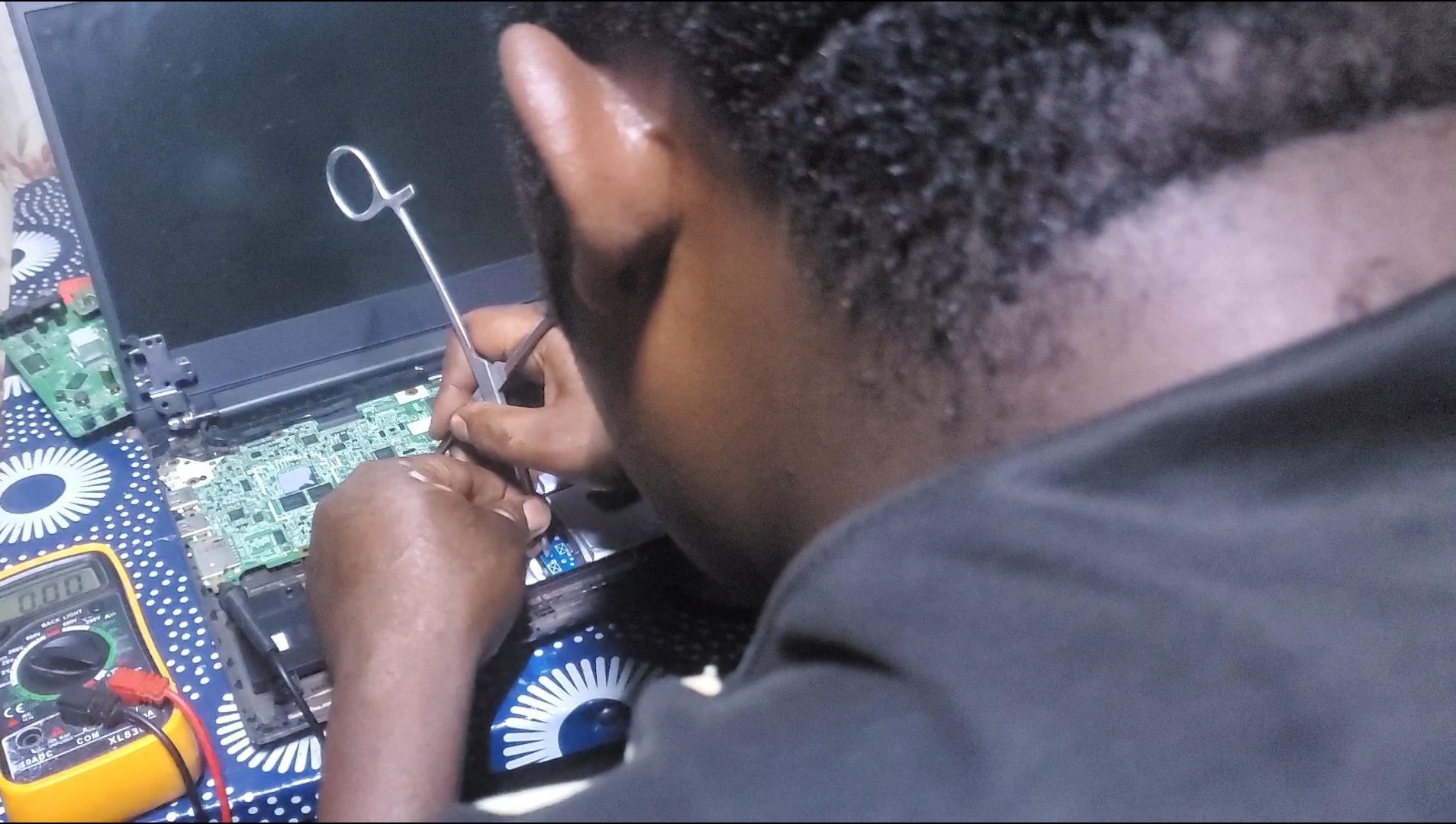 Shabani Aime at work